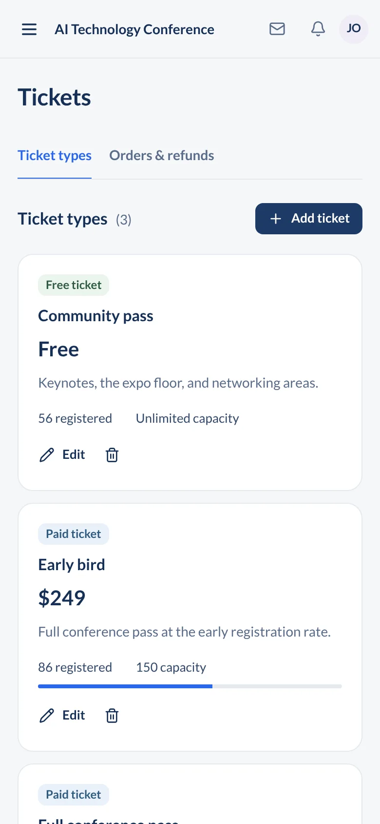 Organizer ticket types on a phone with free and paid passes